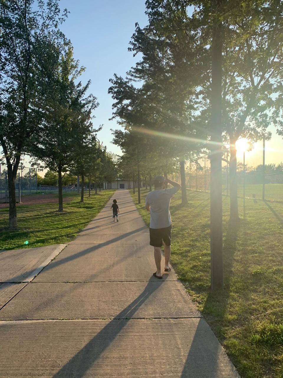 Derich and his son at a park in Ontario